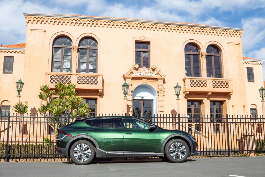 Kia EV6 Air Long Range RWD side profile, parked next to building