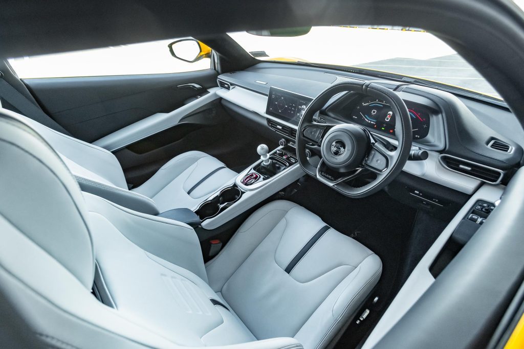 Interior view of the Lotus Emira V6 First Edition, with white leather