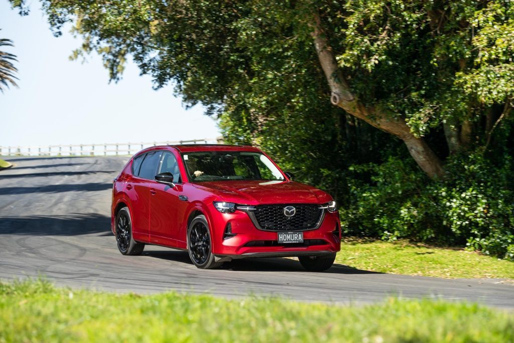 Red Mazda CX-60 Homura PHEV taking a corner