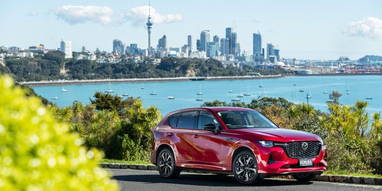 Mazda CX-60 Homura PHEV parked with Auckland city in background