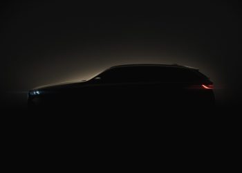 BMW 5 Series Touring silhouette with lights on