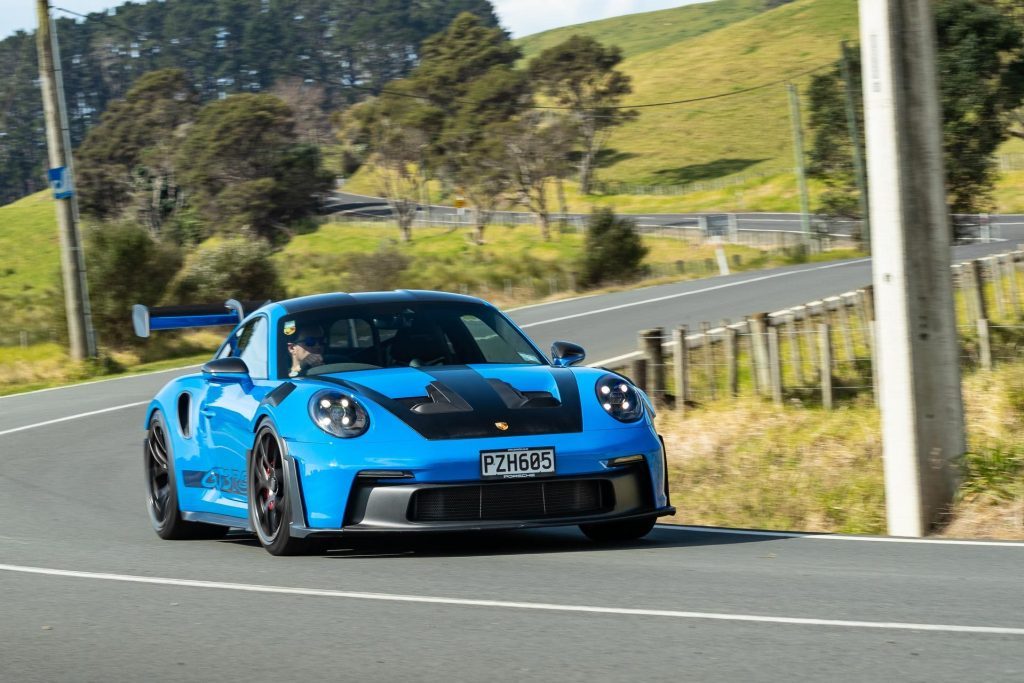 Porsche 911 GT3 RS cornering on New Zealand roads