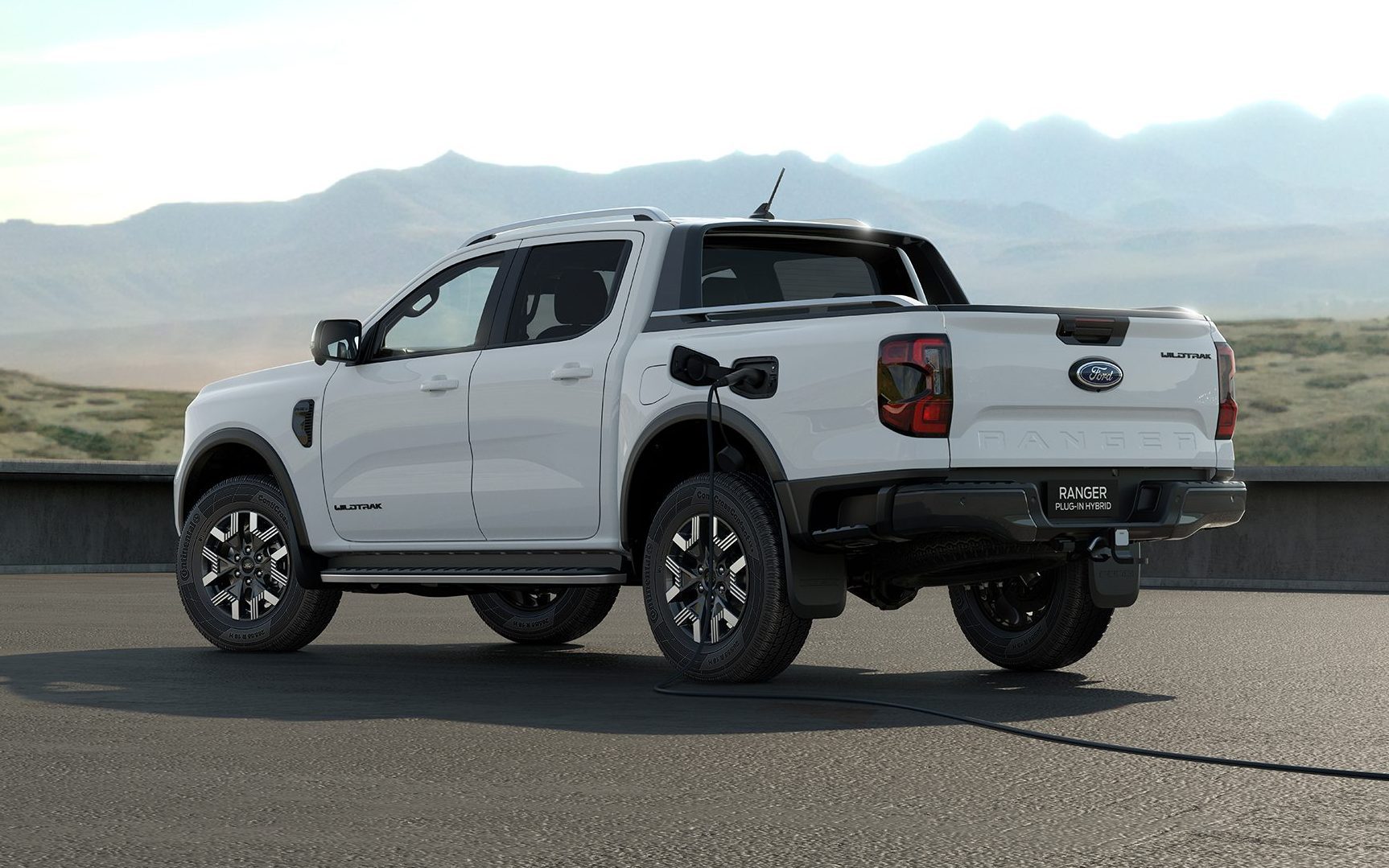 Ford Ranger plug-in hybrid with charging cable plugged in