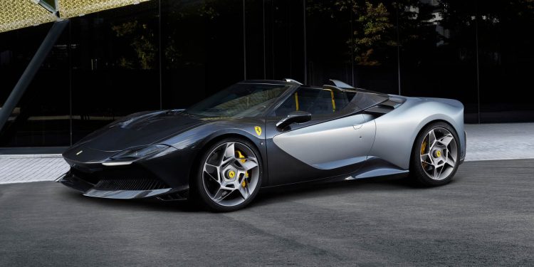 Ferrari SP-8 parked next to building