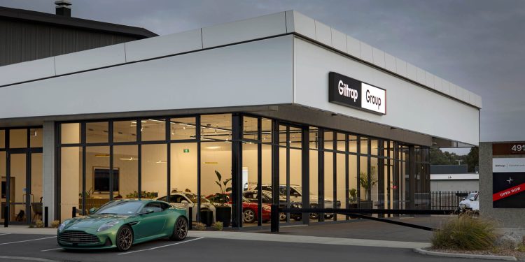 Aston Martin DB12 parked outside of Giltrap Christchurch showroom