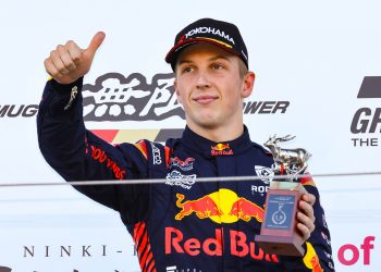 Liam Lawson giving thumbs up on Super Formula podium at Suzuka