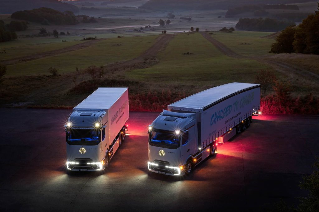 Pair of Mercedes-Benz eActros 600s with lights on