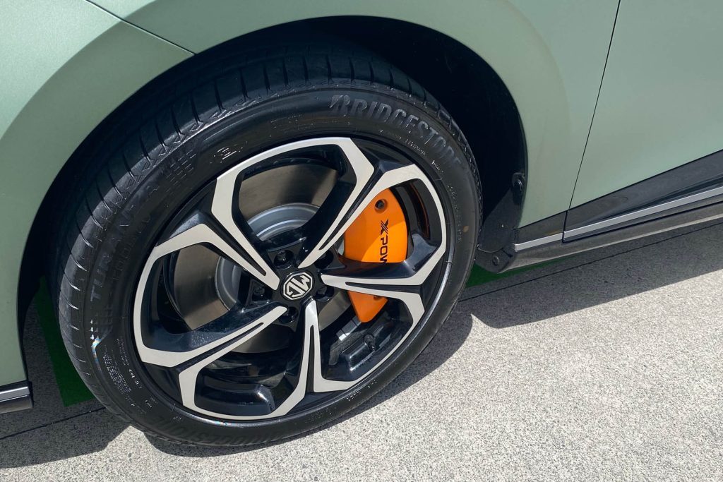 MG4 XPower front wheel with orange brake caliper