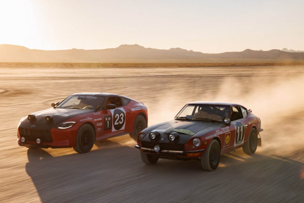 Nissan Safari Rally Z Tribute driving next to 240Z rally car