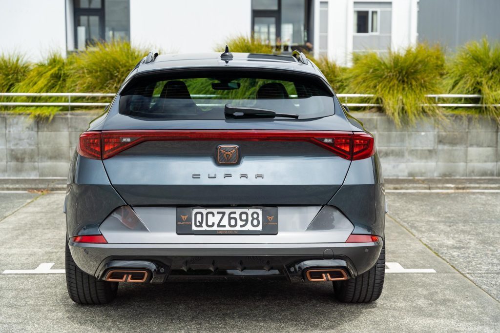 Rear view of the Cupra Formentor V e-Hybrid, showing mock exhausts