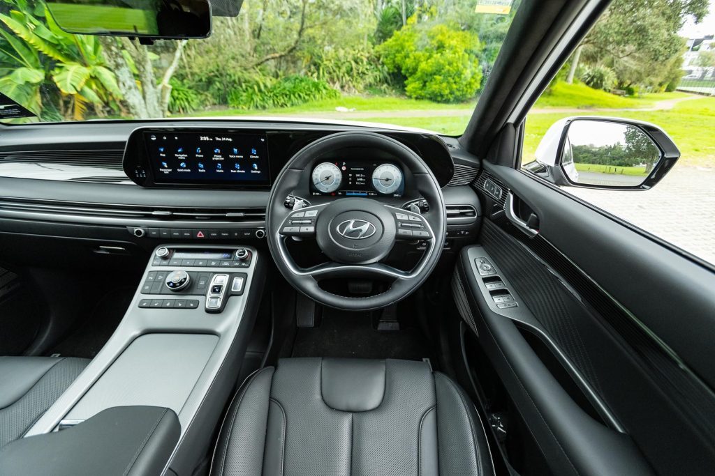 Driver's POV in the Hyundai Palisade, showing infotainment screen and dash