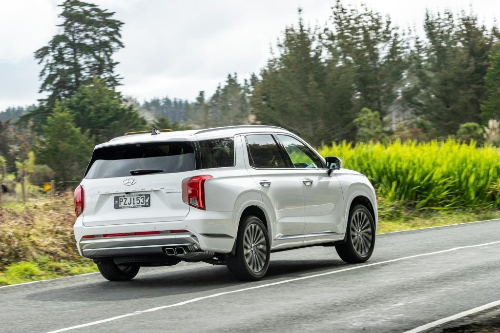 Hyundai Palisade rear view, cornering at pace