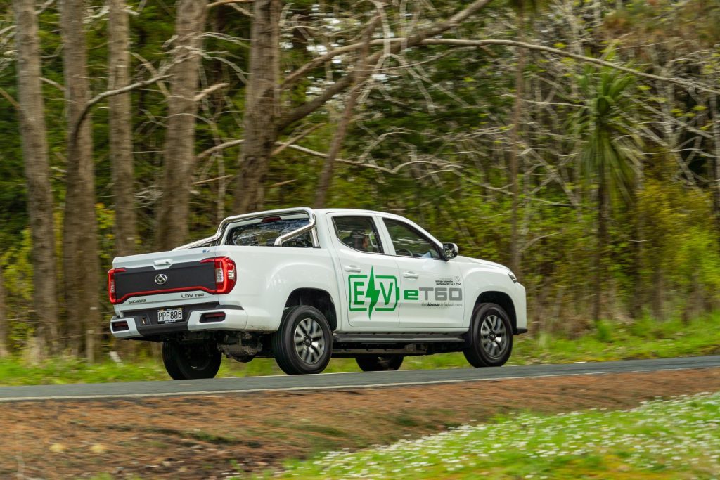 Rear view of the LDV e-T60 driving on a backroad