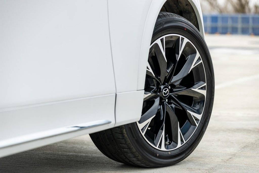 Front wheel detail on the Mazda CX-90 Takami