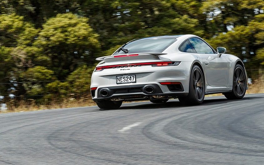 Porsche 911 Turbo driving around corner