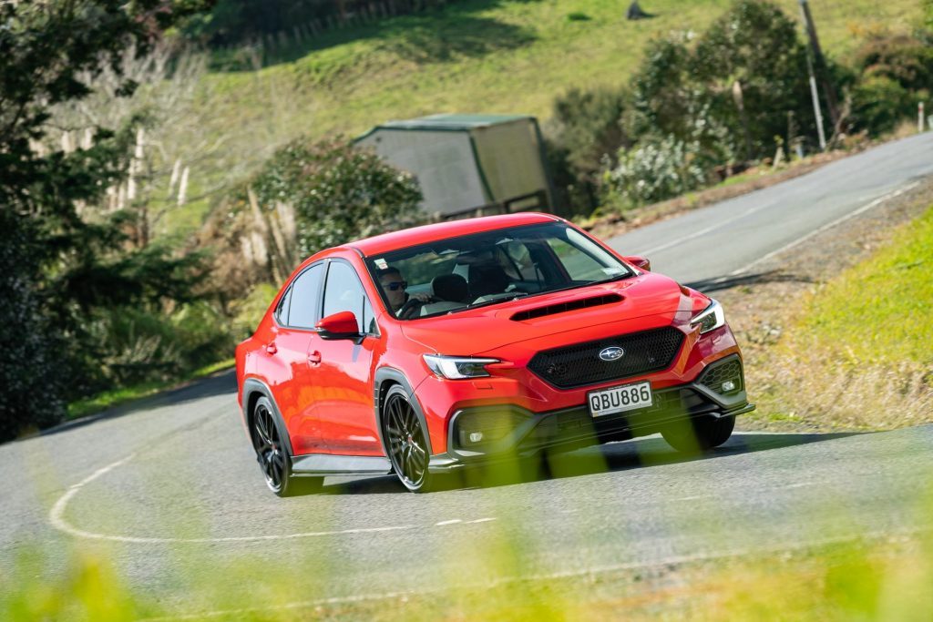 Subaru WRX AKA taking a corner at speed, front on