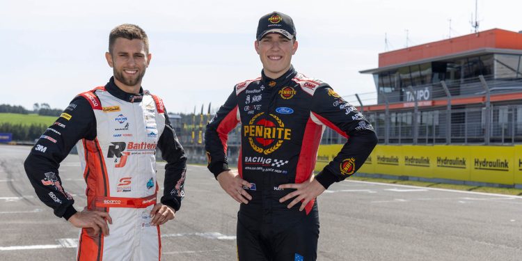 Andre Heimgartner and Matt Payne standing on grid at Taupo International Motorsport Park