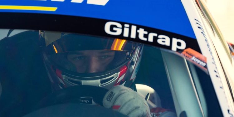 Marco Giltrap sitting behind wheel of Porsche Sprint Challenge car