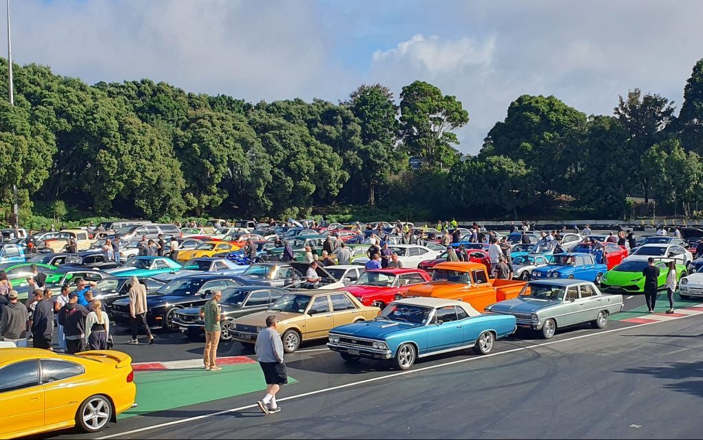 Cars parked in rows at event