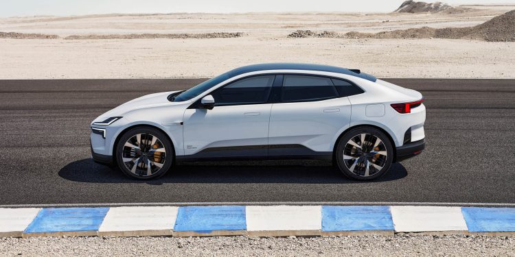 Side profile view of Polestar 4 on race track in desert