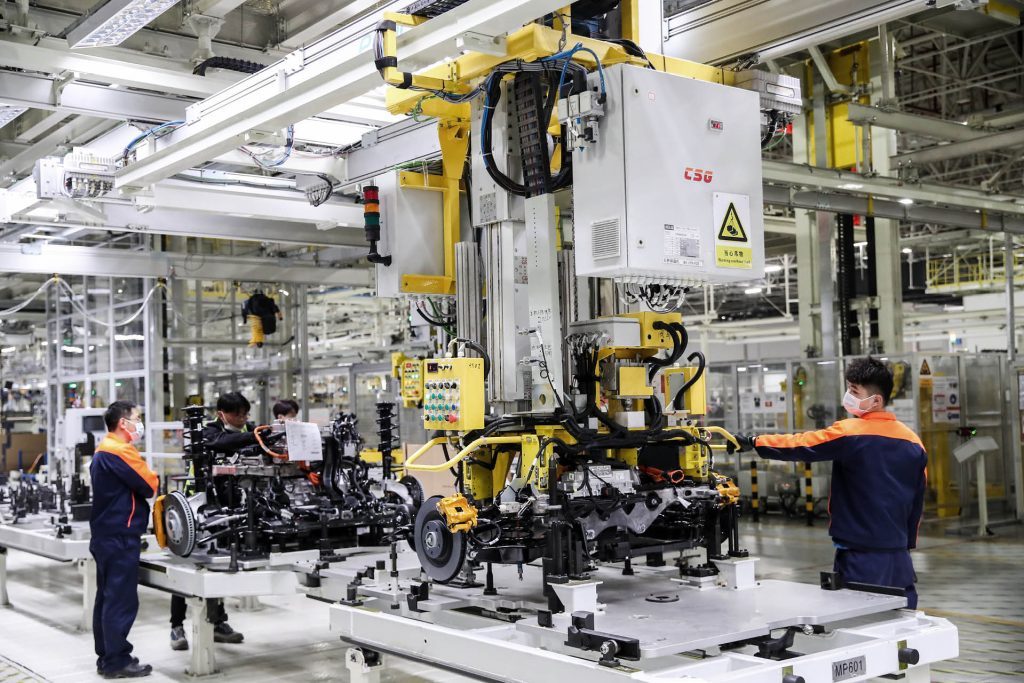 People working on Polestar production line in Chinese factory