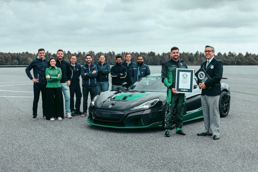 People standing around Rimac Nevera as Guinness World Record awarded