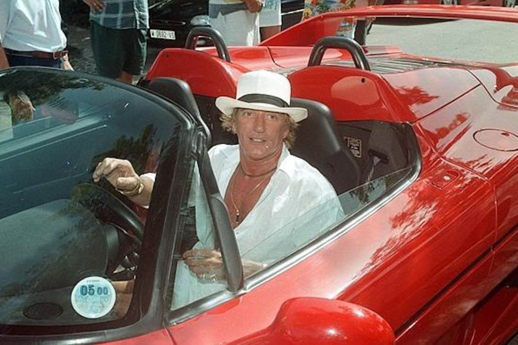 Rod Stewart driving Ferrari F50