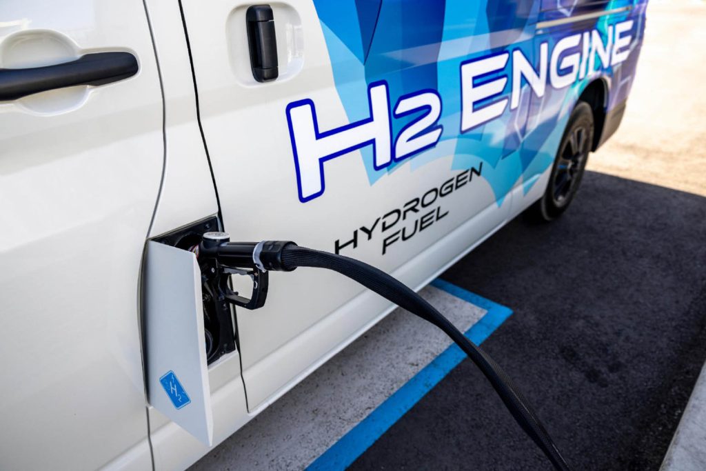 Hydrogen-fuelled Toyota Hiace being refuelled