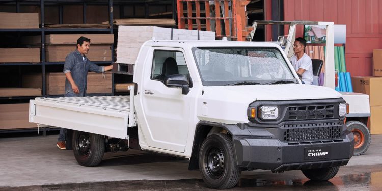 Toyota Hilux Champ being loaded with cargo