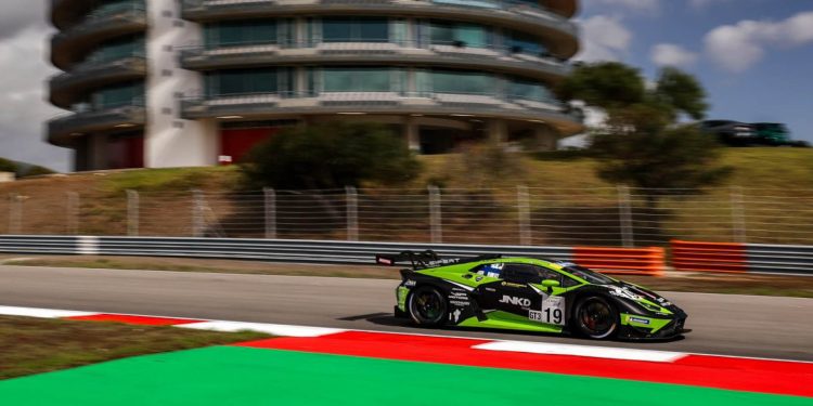 Lamborghini Huracan GT3 racing past building in Portimao