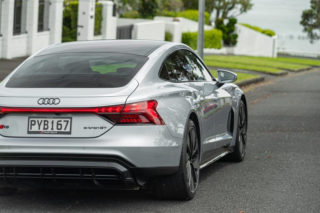 Rear quarter detail of the Audi RS e-tron GT, showing wide guards