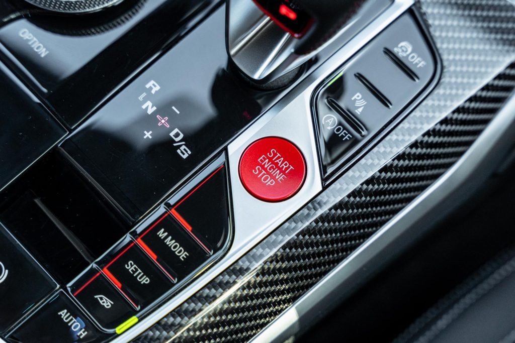 Carbon fibre and red accents of the BMW M2 Competition centre console
