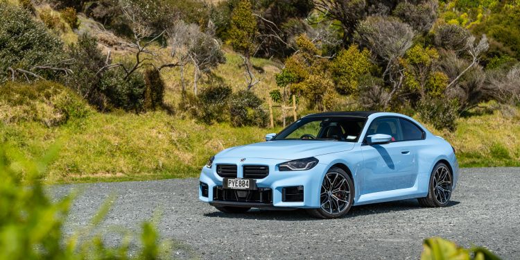 BMW M2 Competition front quarter view, in blue