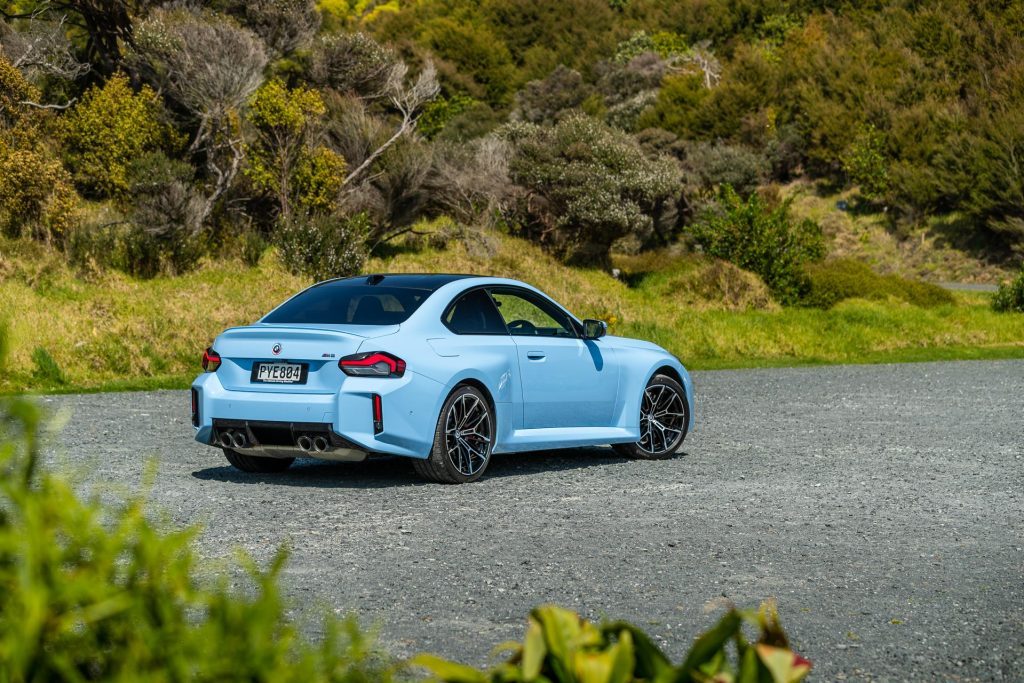 BMW M2 Competition rear quarter view, in blue