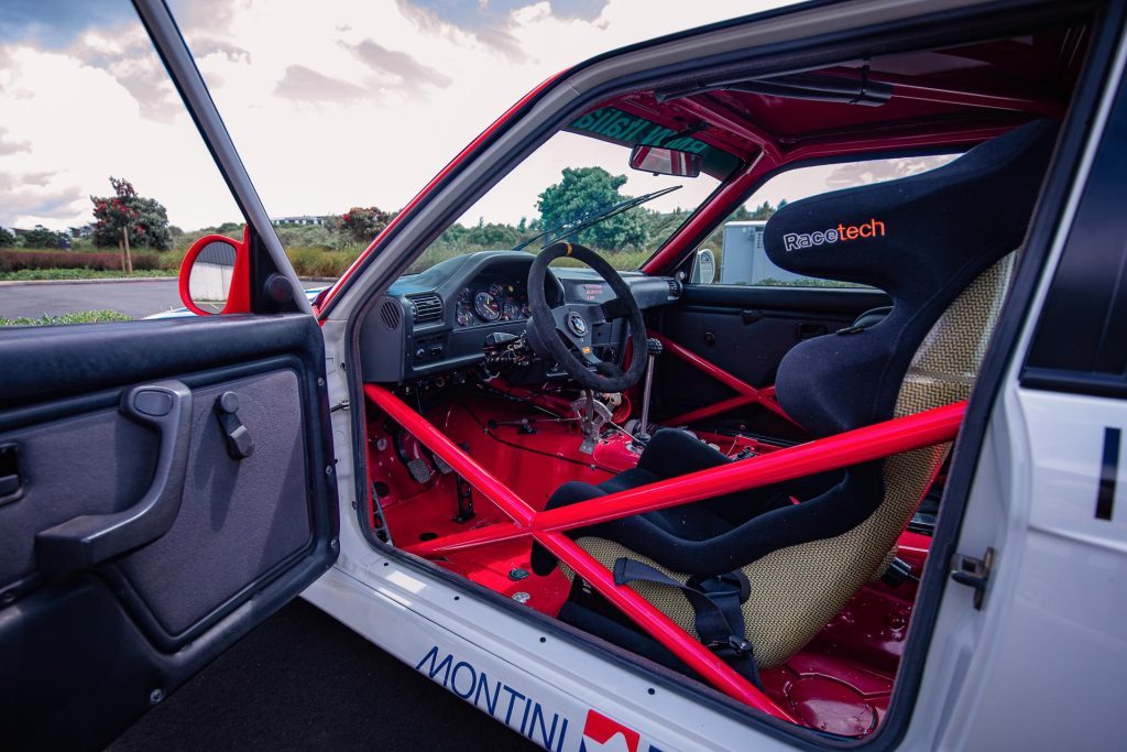 Interior view of the BMW M3 Group A, with roll cage