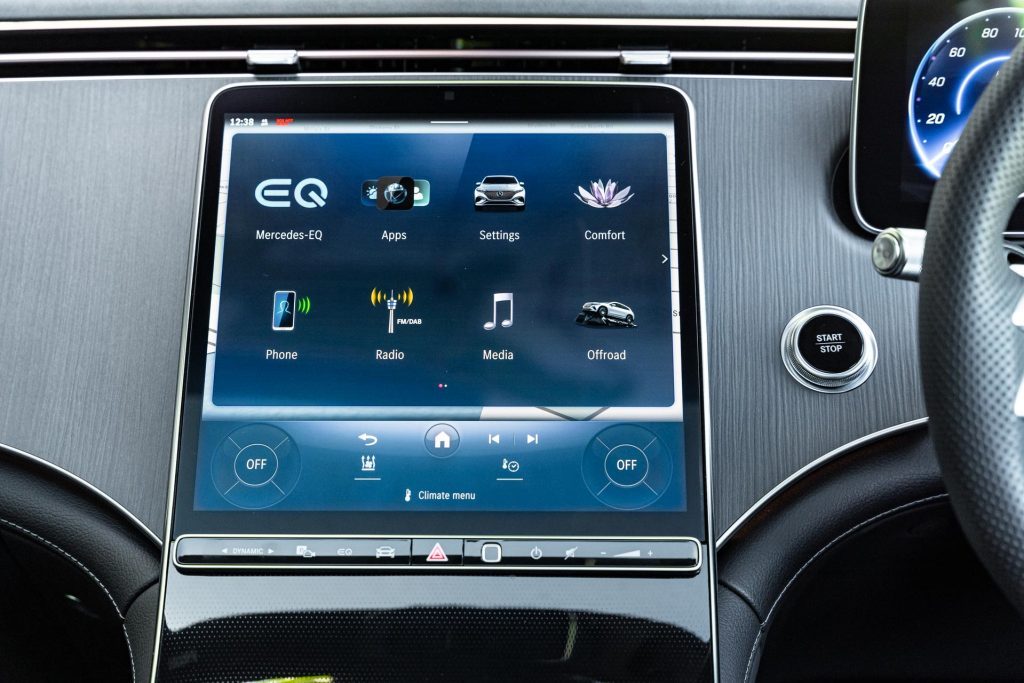Infotainment screen of the Mercedes-Benz EQS 450, with haptic buttons below