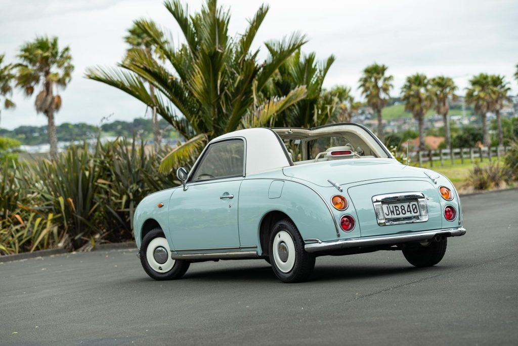 Nissan Figaro roof off parked