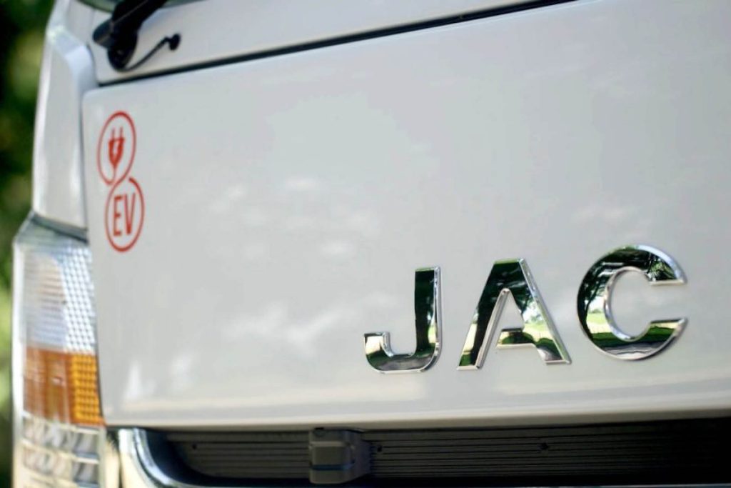 JAC EV truck badge close up badge