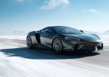 McLaren GTS driving on snowy road