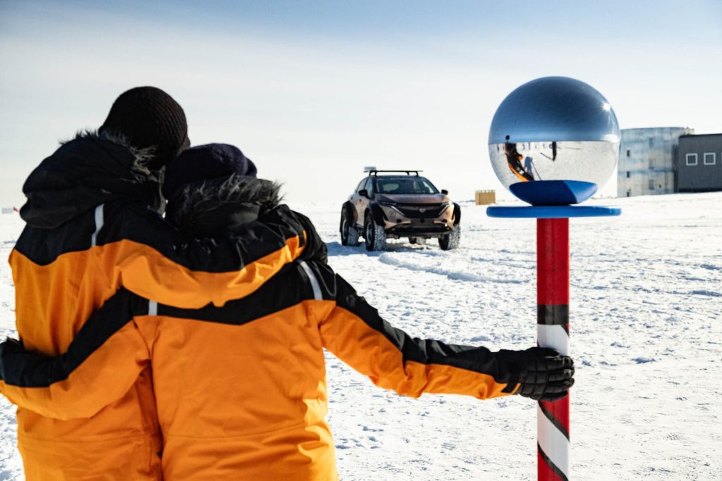 Husband and wife celebrate competition of pole-to-pole adventure in Nissan Ariya at South Pole