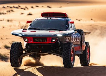 2024 Audi RS Q e-Tron jumping over sand dune during Dakar 2024