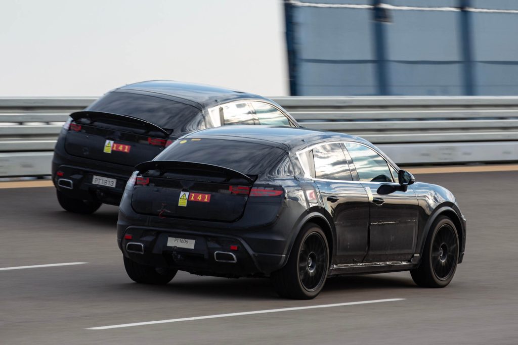 Two 2024 Porsche Macan electric SUVs on test track