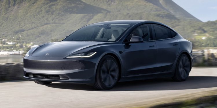 2024 Tesla Model 3 facelift driving past mountains