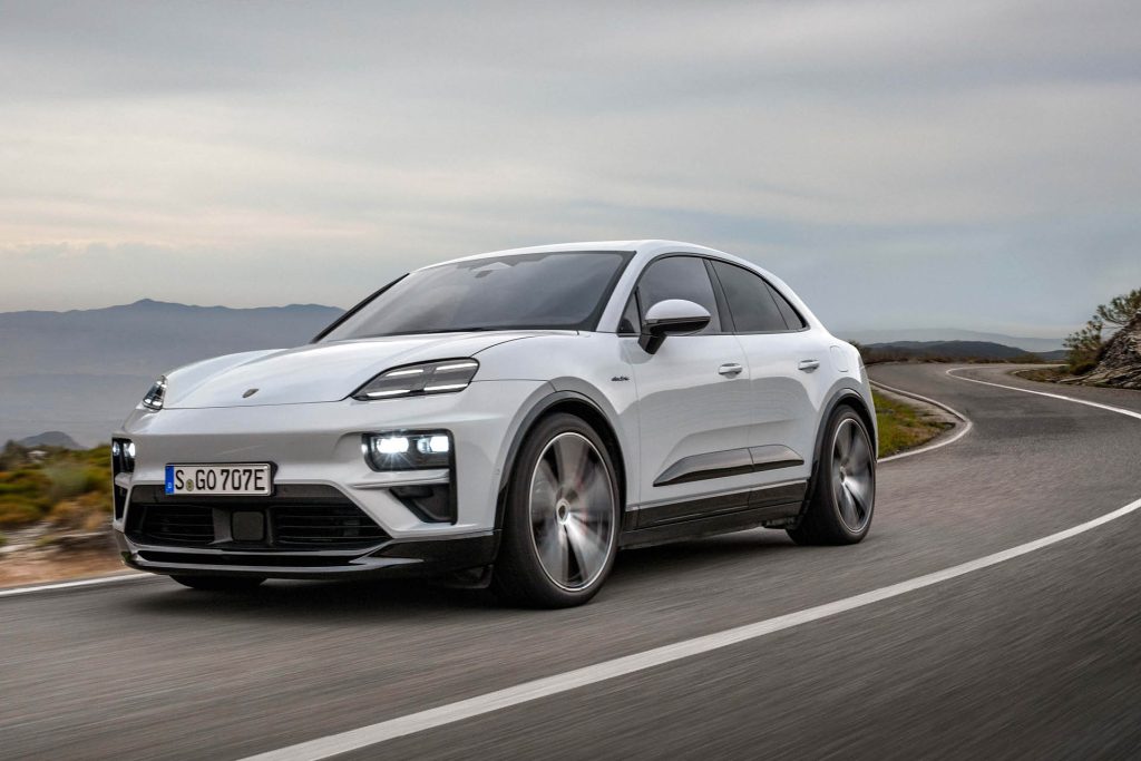 2025 Porsche Macan EV driving on twisty road