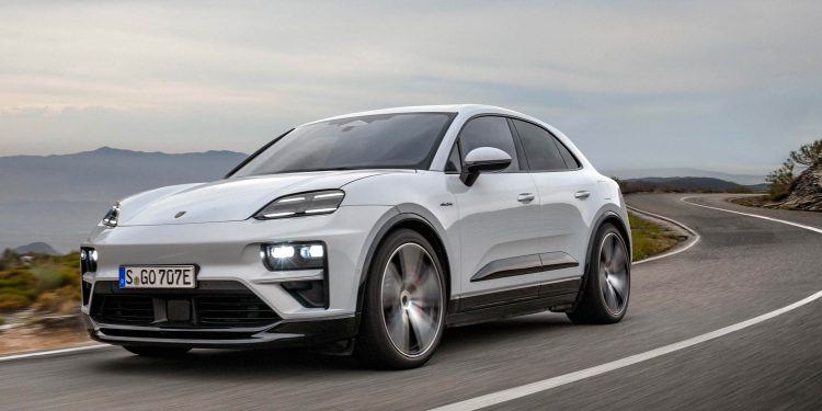 2025 Porsche Macan EV driving on twisty road