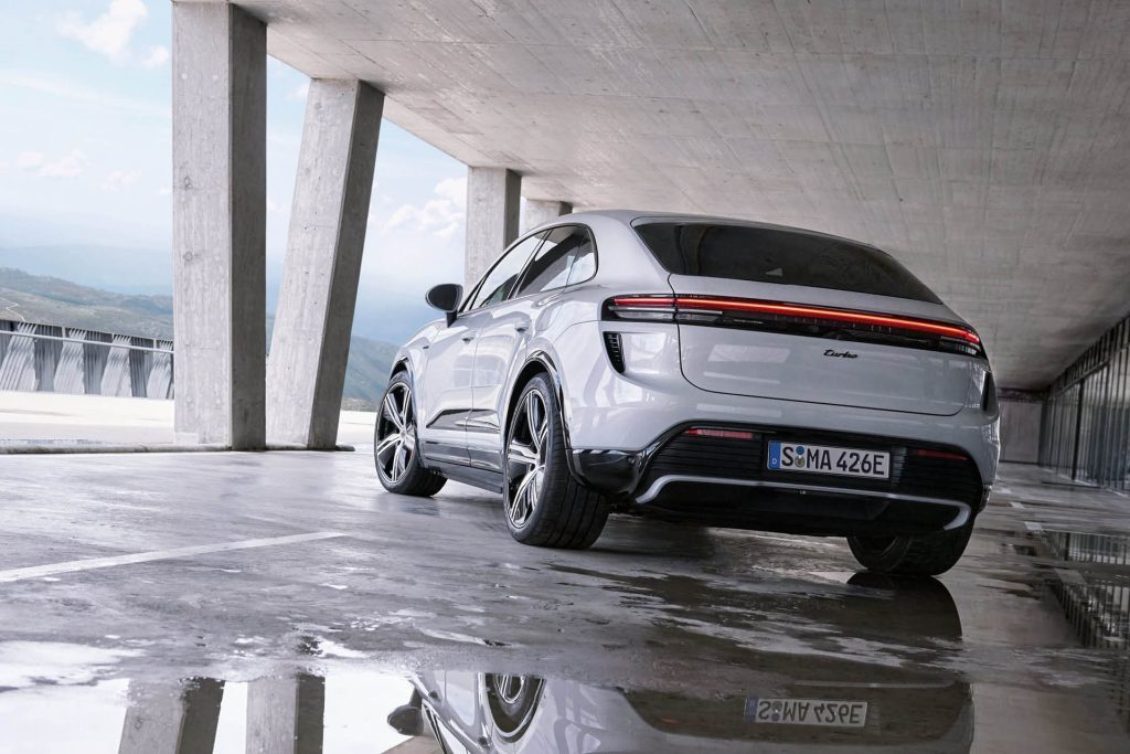 2025 Porsche Macan EV parked under concrete structure