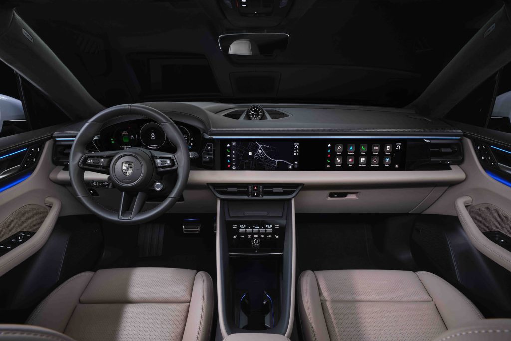 2025 Porsche Macan EV interior with passenger display