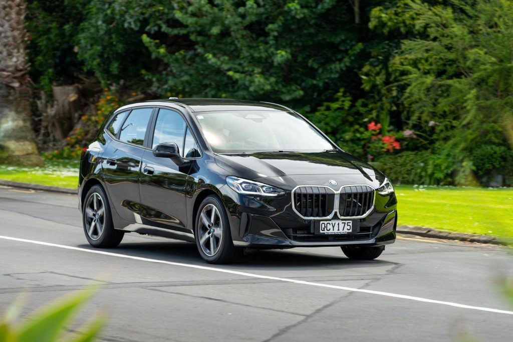 BMW 225e xDrive Active Tourer driving past, front quarter shot