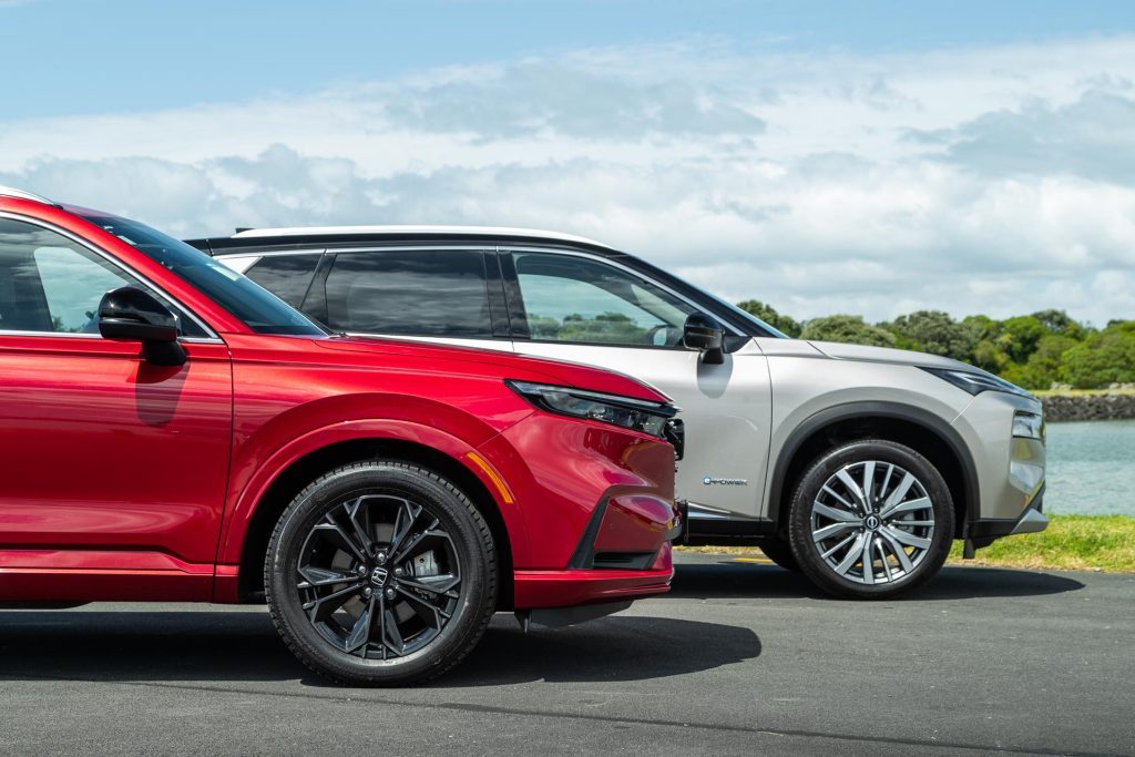 Honda CR-V RS and Nissan X-Trail e-Power Ti-L side by side, showing fronts