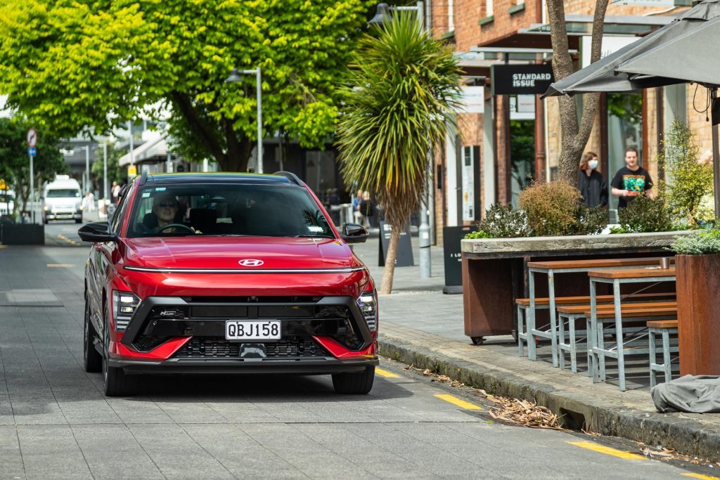 Hyundai Kona 1.6T N Line Limited driving in a suburban area